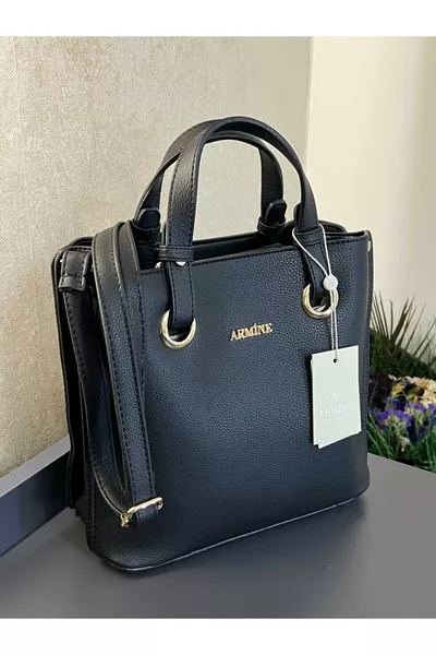 ARM..SY حقيبة جلدية مصممة خصيصًا لتكون حقيبة يد ومعصم بلون مميز من Armine