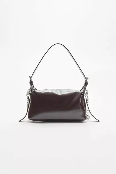 حقيبة يد مفصلة بمقبض