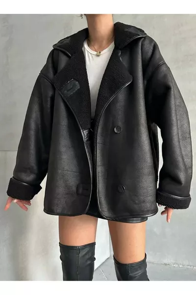 سترة نسائية سوداء كبيرة الحجم