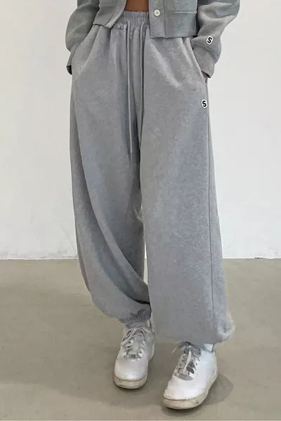 بنطال رياضي نسائي فضفاض من خيطين باللون الأسود