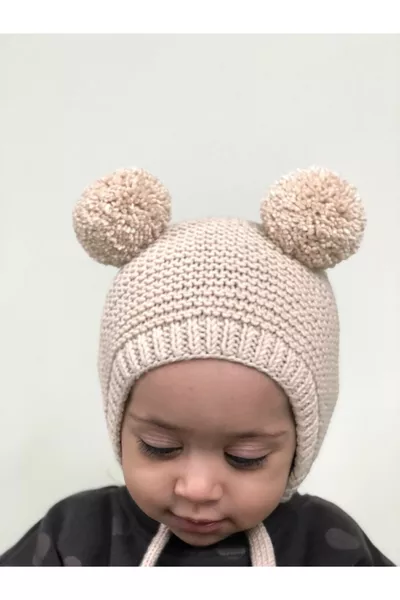 Unisex Gebreide Babymuts met Pompon - Crème