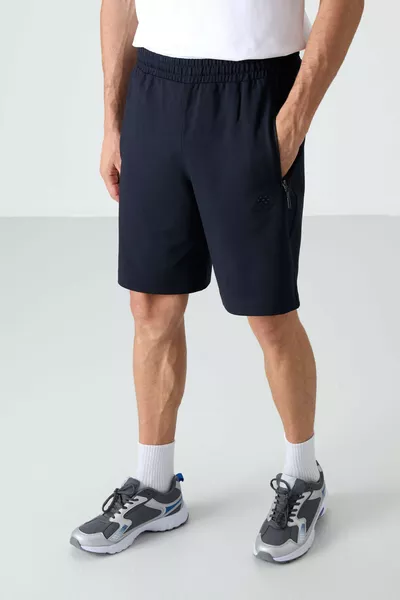 Dunkelblauer Herrenshorts mit verdecktem Reißverschluss, hinterer Tasche, Kordelzug und normaler Passform - 