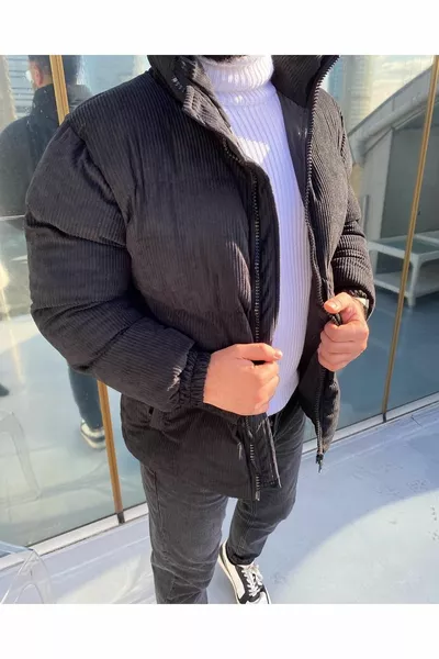 Бархатный черный пуховик в рубчик