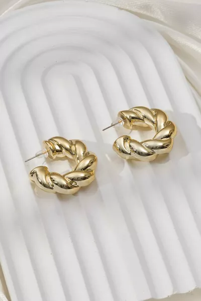 Orecchini a cerchio in acciaio grandi torsionati da donna importati