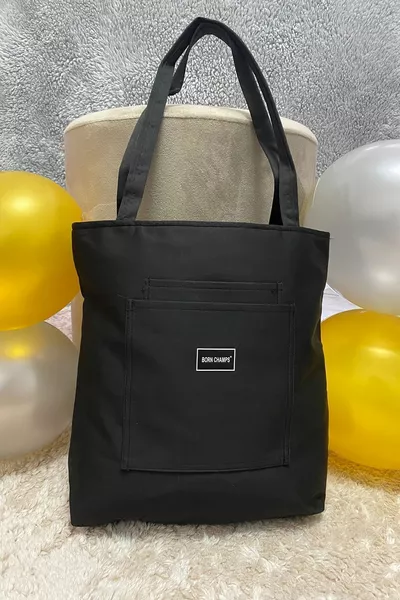 حقيبة كتف قماشية ناعمة بسحّاب وجيوب أمامية، واسعة للاستخدام على الذراع والكتف