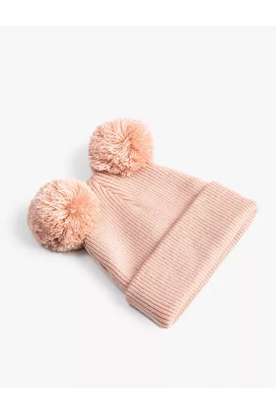 Berretto a maglia con pon pon