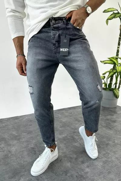 جينز رجالي رمادي ممزق بتفاصيل للجينز