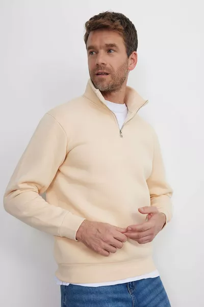 سويت شيرت بياقة عالية نصف سحاب، قطن مريح مبطن بالقطن داخلياً، بقصة فضفاضة للجنسين، بلون عاجي