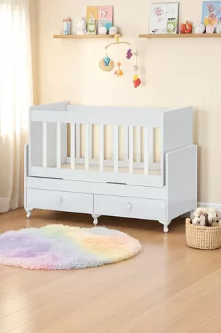 Berceau à bascule avec tiroirs pour côté de lit