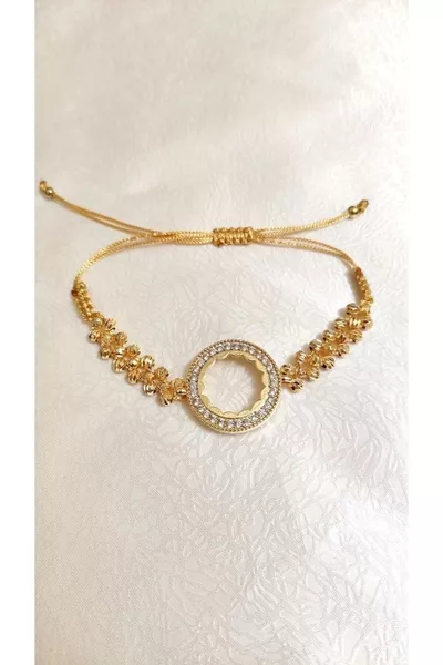 إطار سوار ربع دينار يُوضع فيه ربع دينار واحد