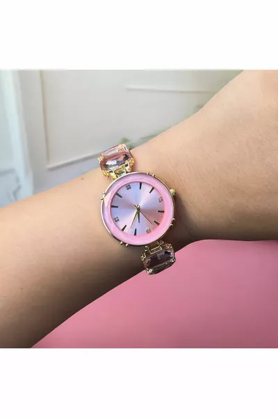 ساعة يد نسائية وردية بحجر مرصع
