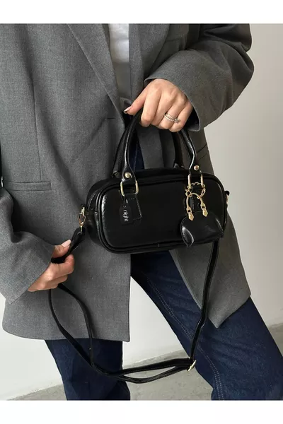 حقيبة يد وكتف نسائية من بوني موديل باللون الأسود مع قطعة شَارْم هدية