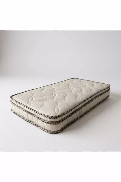 سرير طفل من الخيزران مع وسادة تقويمية