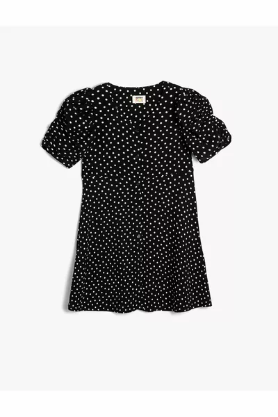 Gepunktetes Kleid mit Puffärmeln und Knopfverschluss aus Viskosestoff