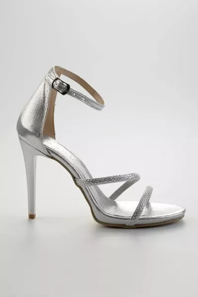 عرجاء المرأة مساء اللباس أحذية 