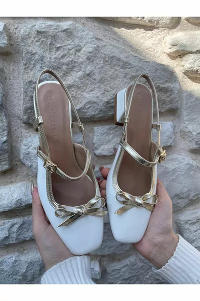 Ballerines en cuir verni doré blanc avec nœud Lena