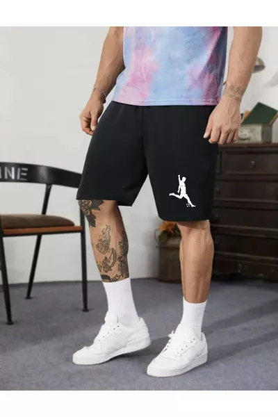 Short homme en tissu coton avec imprimé footballeur