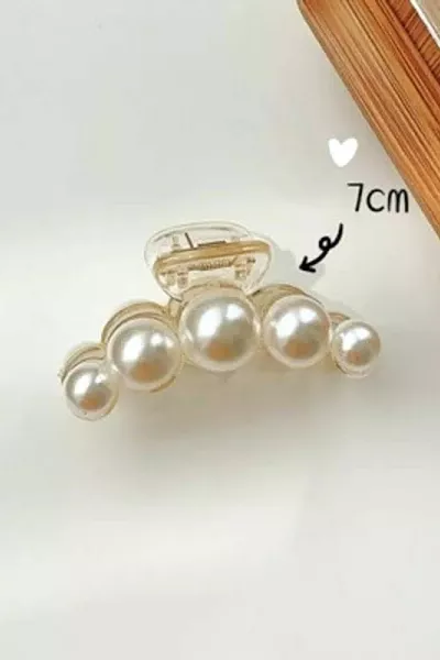 Fermoir perle de taille moyenne 7 cm.