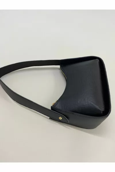 حقيبة باغيت سوداء منقوشة كروكو نسائية