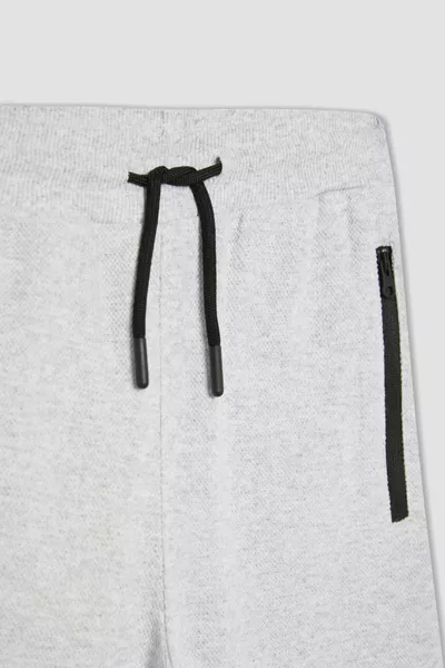 Pantaloni della tuta Zip Piqué Basic da ragazzo sp