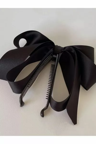 Fermoir banane avec nœud surdimensionné