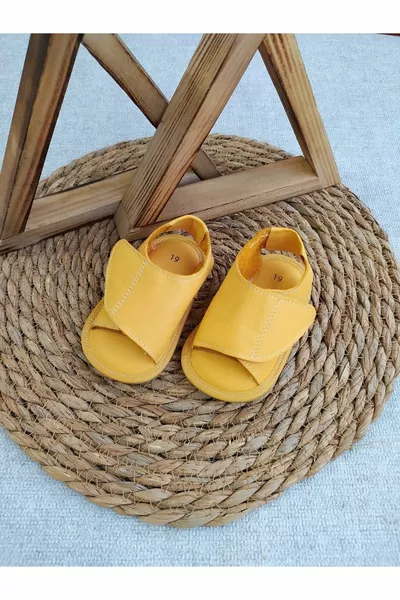 للجنسين نموذج جلد طبيعي مضاد للانزلاق صنادل الطفل الوحيد