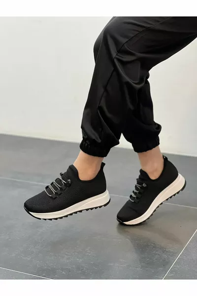 ديفا الحجر الأسود تريكو أحذية رياضية عارضة