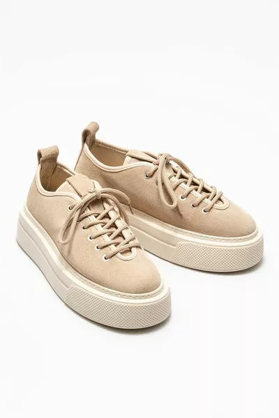 حذاء رياضي نسائي جلد بيج