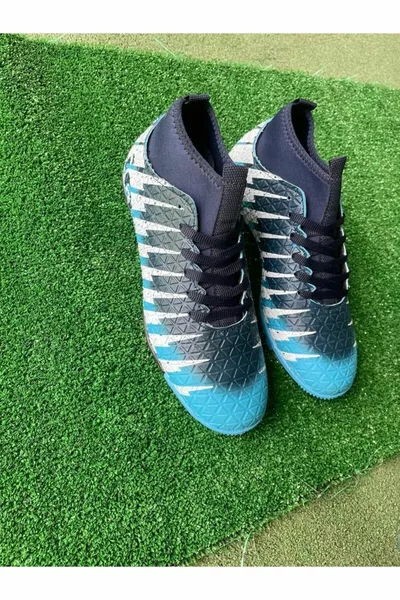Nouveau modèle chaussettes chaussures de football nouvelle saison et design élégant unisexe édenté Astroturf chaussures