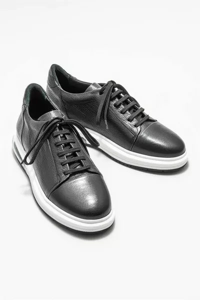 حذاء رياضي رجالي جلد أسود