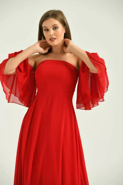 Chiffon long evening dress with flywheel sleeve or low shoulder detail