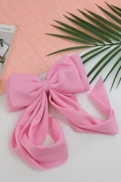 ربطة شعر طويلة مع فيونكة