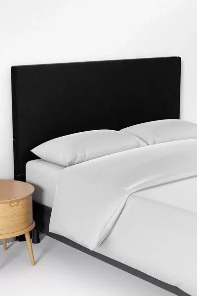 Copertura per testiera del letto in tessuto di colore nero uniforme