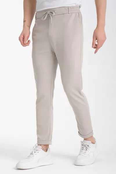 بنطلون رجالي بخصر مطاطي مع ليكرا وطية عند الساقين ستايل جوغر