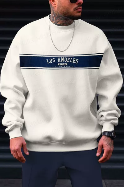 سويت شيرت بولار رجالي بلون كريمي مائل للأبيض بطباعة City Of Angels بياقة دائرية، واسع ومريح بقصة فضفاضة