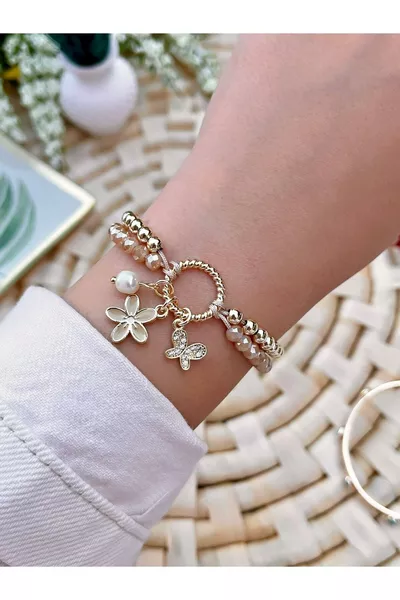 Glücksblume und Schmetterlingsarmband