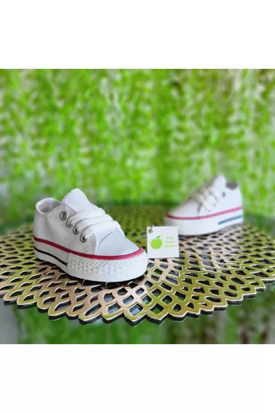 Licht brede pasvorm unisex kinder- en babysneakers met korte veters van linnen canvas