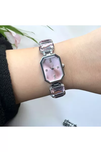 Damespolshorloge met roze steen