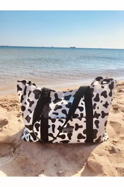 حقيبة شاطئ/يد/كتف/رياضة متعددة الاستخدامات سوداء مقاومة للماء بنقشة بقرة وبجيب داخلي