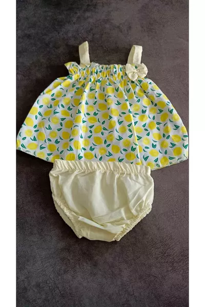 طقم بناتي بطبعة اليوسفي الأصفر