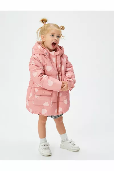 Cappotto per bambina con fantasia rosa
