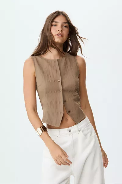 Buttoned and textured ball