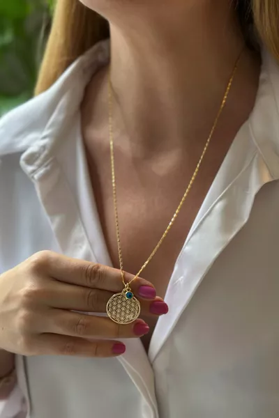 قلادة زهرة الحياة بتفاصيل عين الحسد