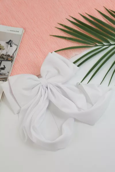 ربطة شعر طويلة مع فيونكة