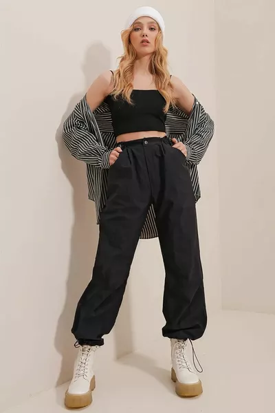 المرأة السراويل السوداء المظلة النسيج