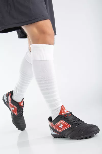 الرجال أسود أحمر عدم الانزلاق وحيد Astroturf أحذية خفيفة الوزن لكرة القدم المربط