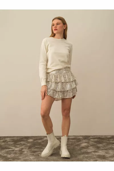 Gonna da donna con pantaloncini con paillettes beige arruffata