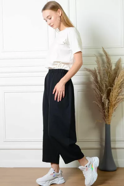 Damen Baggy Cut Schwarze Hose mit elastischen Taschen 