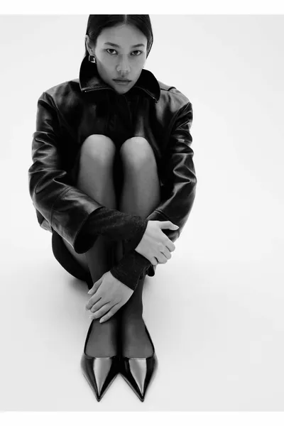 كعب جلد لامع