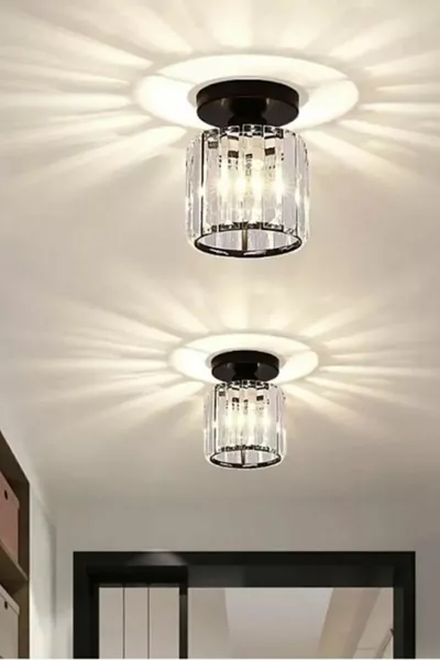 ثريا موديل كيارو فورت بلون أسود بجسم معدني مزين بحجارة كريستالية من سلسلة الفخامة الحديثة